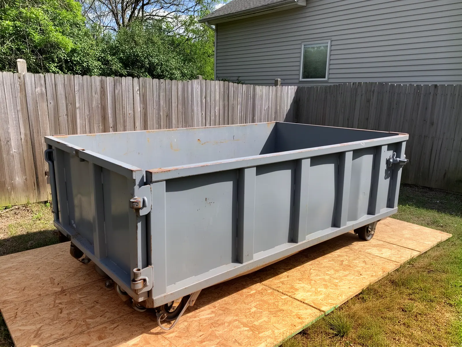 Roll-off dumpster from Swan Lake Dumpster Rental in Sebring, FL